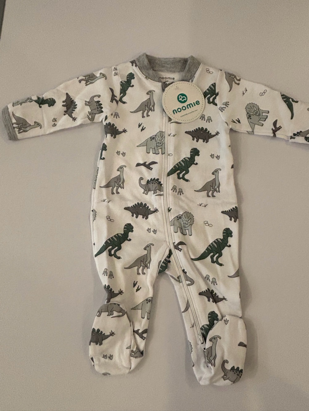 Noomie White & Green Dinosaur Footed One-Piece